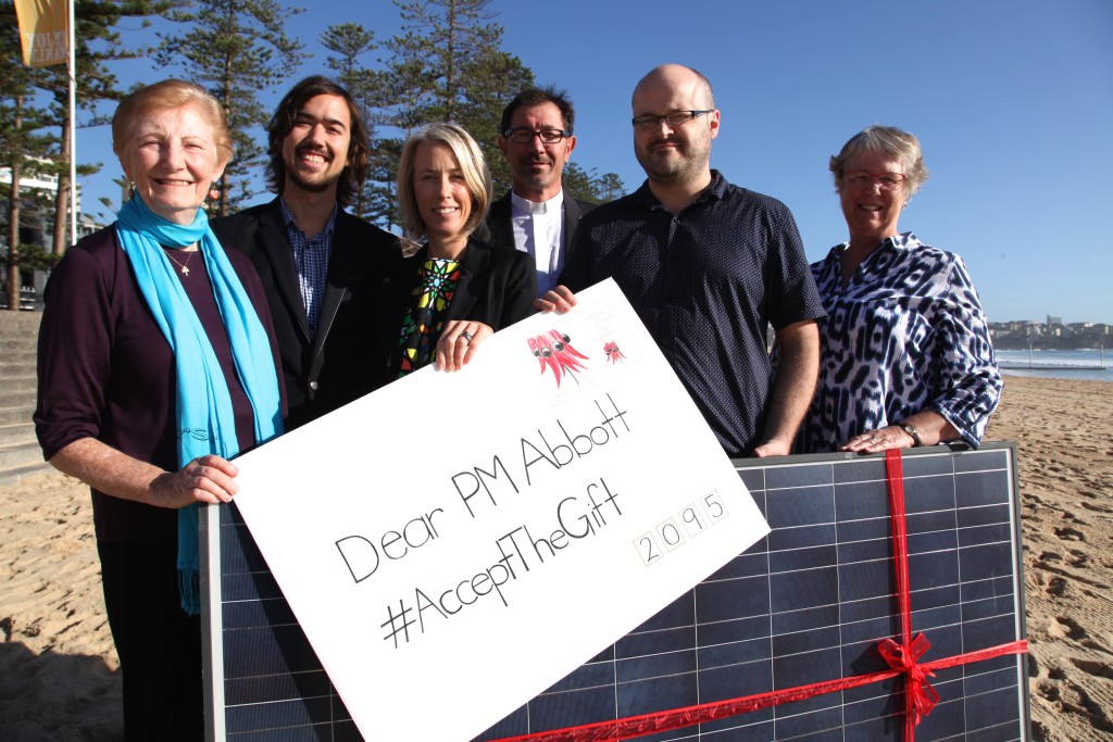 May 2015: Catholic Earthcare Director Jacqui Remond (third from left), with the group Common Grace, gifting Solar Panels to Tony Abbott.